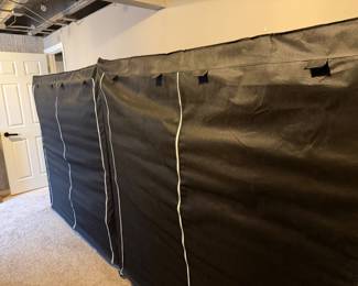 Portable black fabric wardrobe