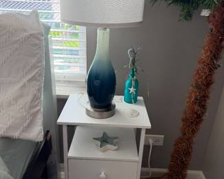 table lamp with a blue ombre finish and white shade & 3- tier white Nightstand with Charging Station 