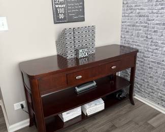 American Signature sofa and console table with two drawers and an open storage shelf. 