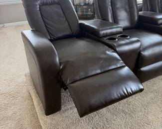 Home theater seating three (3) comfortable reclining seats with storage compartments and cup holders