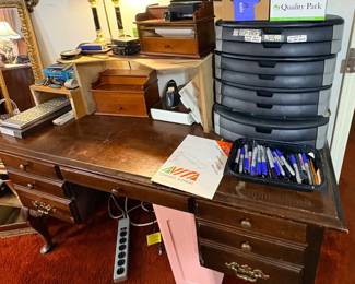 Desk, office supplies, drawers, desk lamp