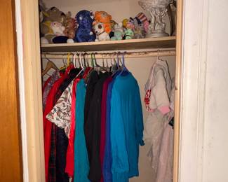 Variety of clothes, some toys