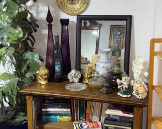 Upstairs hall Cabinet, books, decorative Glass, mirror,  plastic Tall plant