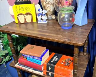 Three tier shelf, books