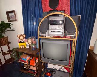 Glass brass shelf, gaming tv, lap top
