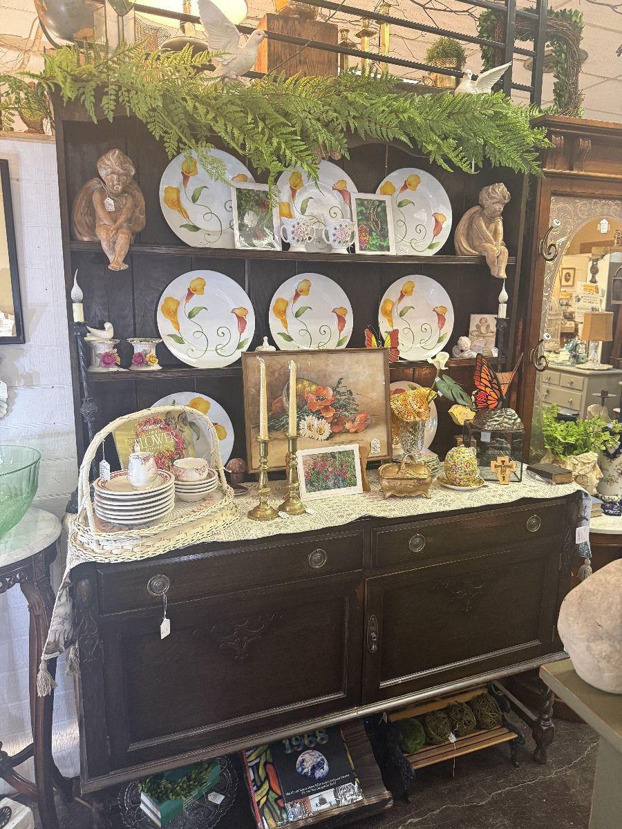 Beautiful vintage buffet, spring dishes, framed floral art, cherubs