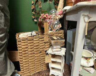 woven stair basket, vintage table, frames