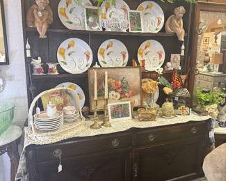 Beautiful vintage buffet, spring dishes, framed floral art, cherubs