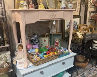 pale pink desk, small side table, vintage doll, gold tone frames