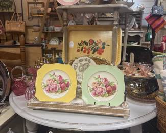 vintage ceramic plates, serving trays, small tables