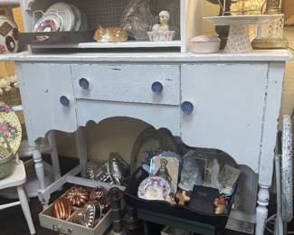 Vintage painted wooden sideboard, copper molds, cake plate