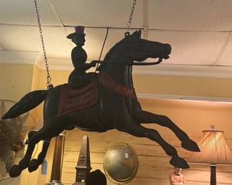 Cast Iron Figural Horse and rider advertising plaque produced by Cincinnati Stove Works, 1903