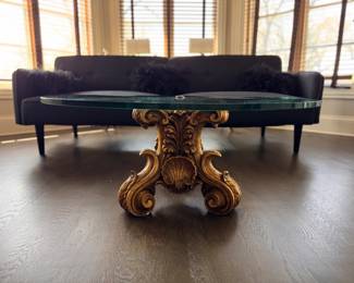        Hollywood Regency Gilt Wood Coffee Table with Glass Top. Measures 36" D x 16" H. Photo 1 of 4. 