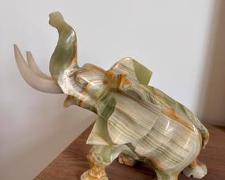 Carved Onyx Elephant. Measures Approximately 12" W x 10" H. 