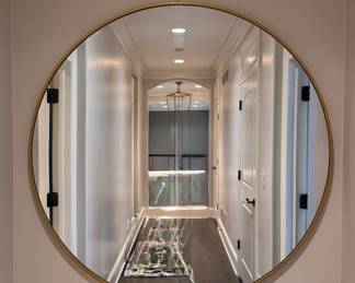 Round Slim Metal Frame Mirror. Measures 48" D. 