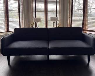 Reclining Futon  / Sofa. Measures 82" W.  Photo 1 of 3. 