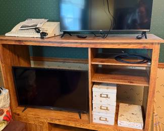 Ent. Center, typewriter, tvs