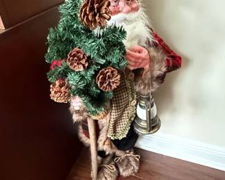 Standing Santa Claus Figure with Lantern and Tree