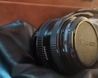 Canon AV mm Film Camera with Canon FD mm f or . Lens and Leather Bag third image