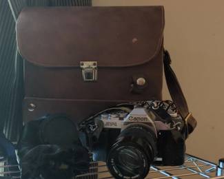 Canon AV mm Film Camera with Canon FD mm f or . Lens and Leather Bag