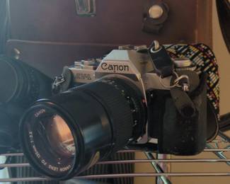 Canon AV mm Film Camera with Canon FD mm f or . Lens and Leather Bag second image