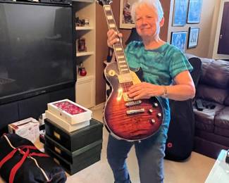 Burch KEEP  Nancy strumming guitar