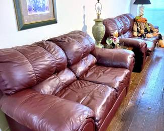 Faux leather burgundy couch and loveseat