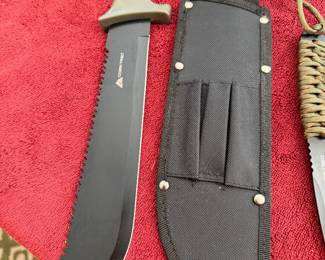 #85 - $80 - Set of 3 Ozark Trail knives with sheaths