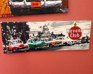 #65 - $150 for both - Cuba unsigned oil painting 21x31 & banner