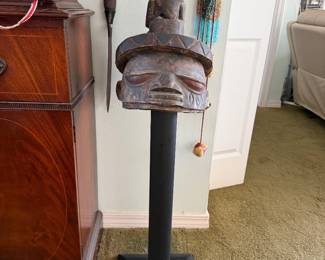 #18 - $350 - Gelede Mask, Nigeria, wood and mineral polychromy. First half of the 20th centuryTribal african carved wood face with child on top 42 x 12 on pedestal 