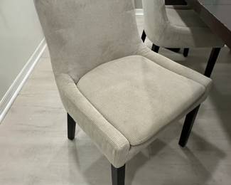 Modern Dark Wood Dining Table with Corduroy Upholstered Chairs second image