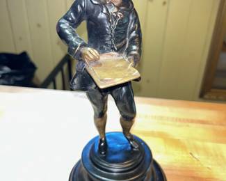 Antique bronze sculpture of young scholar 