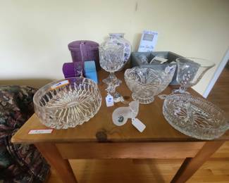 There are many pieces of glassware.