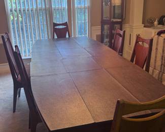 Vintage Teak Expandable Table with the cover on it.