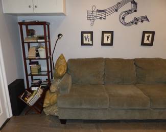 Sofa, Bookcase, Musical Wall Hangings