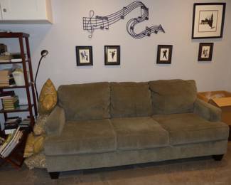 Sofa, Bookcase, Musical Wall Hangings