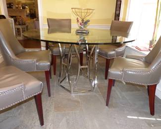 Glass Top Chrome Base Dining Table With 6 Gray Chairs With Nailhead Trim