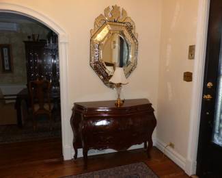 Bombe Chest, Venetian Mirror, Table Lamp