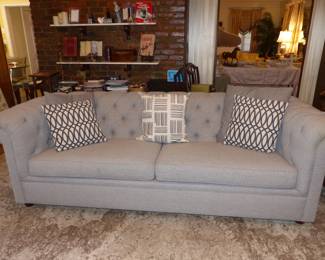 Gray Sofa With Tufted Back