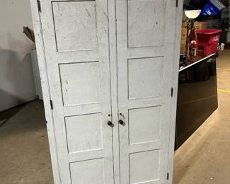 tall primitive cabinet