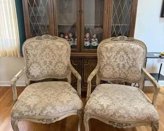 Upholstered captains chairs