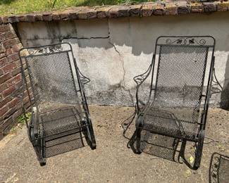 Pair of cantilever metal mesh chairs