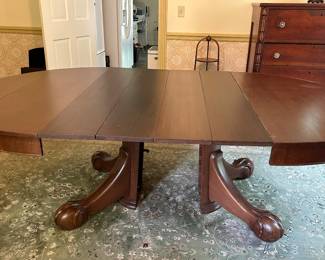 Large dining table with 4 leaves and protective pads
