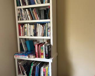 One of 3 very tall bookcases