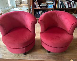 Pair of red swivel chairs