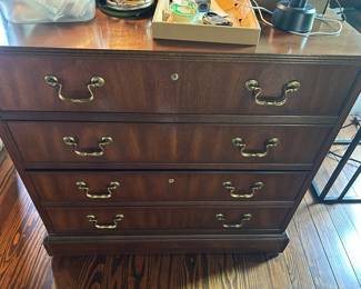 One of 2 matching lateral file cabinets