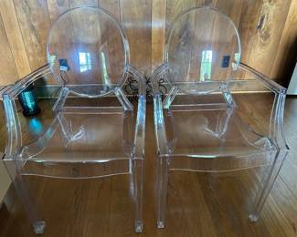 2 of several acrylic chairs 