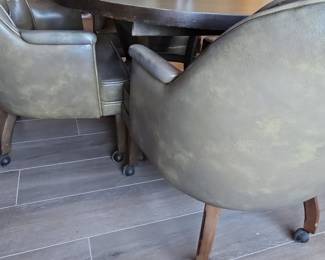 Round Dining Table with Four Tufted Chairs and Leaf