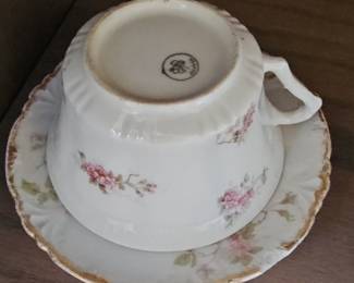 Porcelain Teacup and Saucer with Pink Floral Motif and Gold Trim