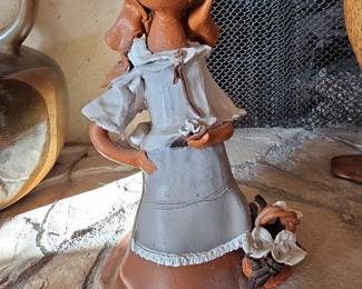 Portuguese Ceramic Figurine of a Woman with Flowers